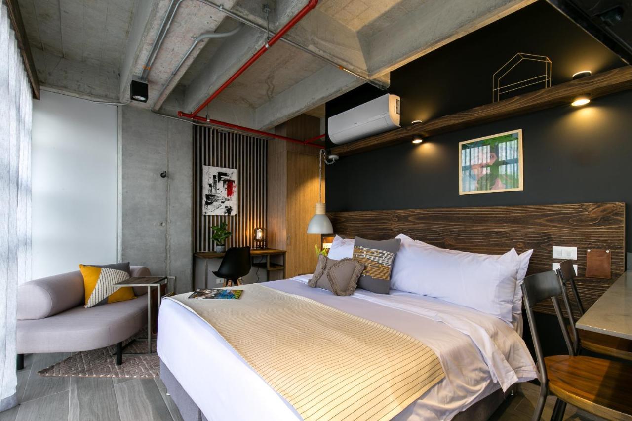 Factory Lofts Hotel Medellin Bagian luar foto